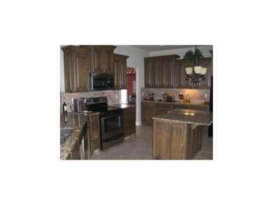 Kitchen. Updated appliances, beautiful fixtures, granite tops!
