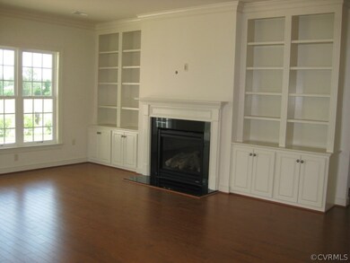 Family Room w/Built In Bookshelves & Gas FP (Model