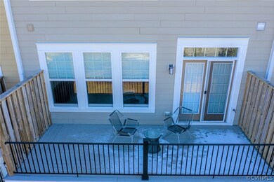 This balcony, off of the family room, has a gas li