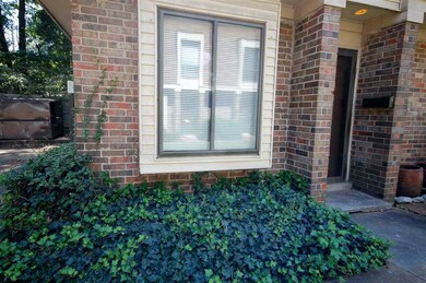 Welcoming entryway with lovely landscaping!