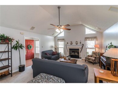 Open Family room with vaulted ceiling, carpet, cei