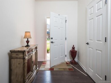 Large foyer opens into Living Room and half bath i
