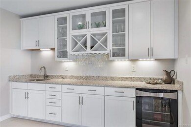 Custom wet bar - granite counters, wine rack, buil