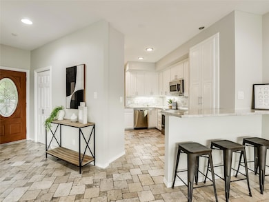 Kitchen featuring tasteful backsplash, a kitchen 