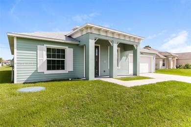 971 SW McComkle Ave, Port Saint Lucie, FL 34953 - photo 2