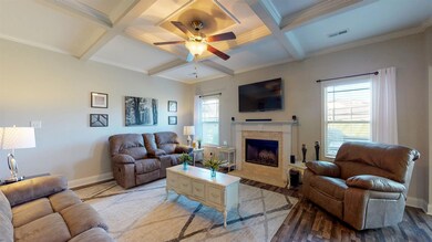 Spacious Living Room with Wood Burning Fireplace!