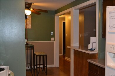 This view from the kitchen looks toward the dining