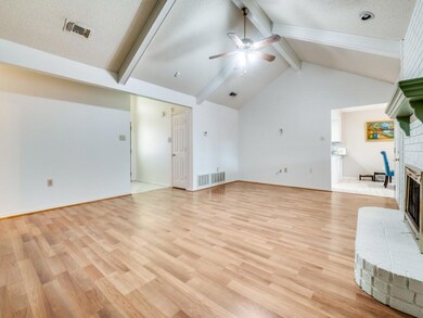 Unfurnished living room with light wood-style floo