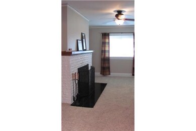 Living Room. Triple-paned replacement windows in c