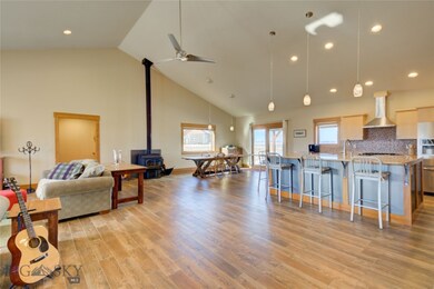 Massive open-concept living space with 16' peak ce