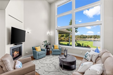 From the moment you cross the threshold, you will be captivated by the Puget Sound and Olympic Mountain views