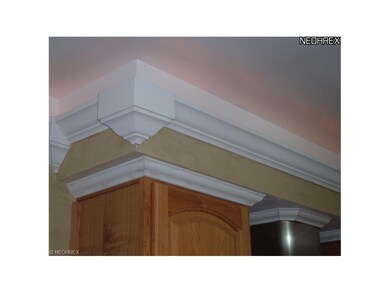 Custom crown molding with recessed lighting