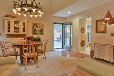 Front door, dining area, entrance to kitchen