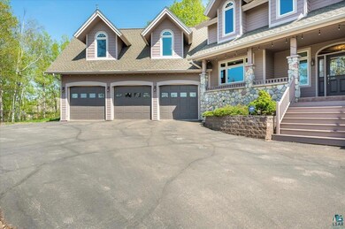 Large 3 Car Garage.  Tall garage doors to easy tru