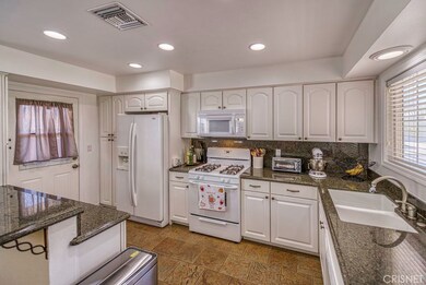 Looking towards kitchen door to side patio