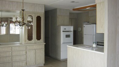 Kitchen from Dining towards hall