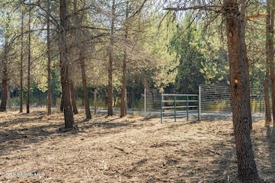 Mel's 5 ac front gate