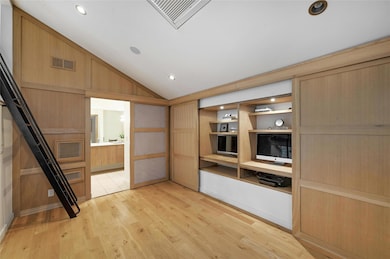 Unfurnished room with light wood finished floors,