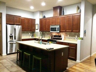 Gourmet Kitchen with Island, dark wood cabinets, s