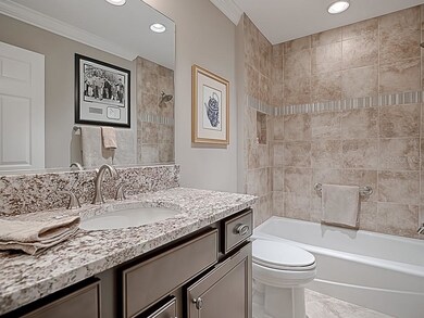 TILE TUB/SHOWER COMBO IN THE 2ND GUEST BATHROOM WI