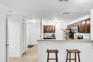 1627 Woodbridge Lakes Cir, West Palm Beach, FL 33406 - photo 5