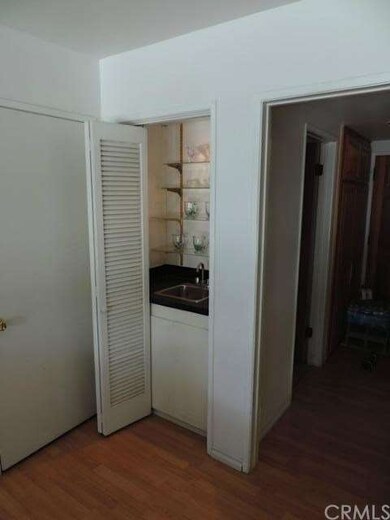 Hidden mini bar perfect for entertaining.