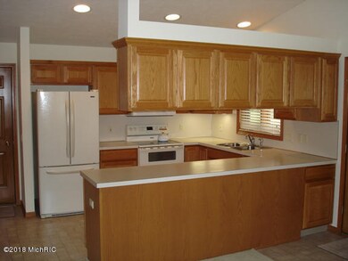 8159 Winding Dr SW unit 21, Byron Center, MI 49315 - photo 2