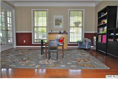 Dining room has french doors from foyer allowing f