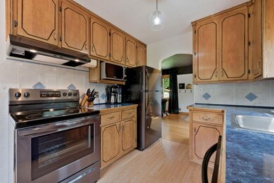 Step into this open, light and bright kitchen with