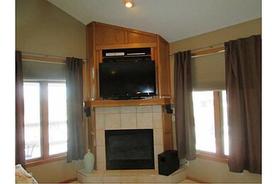 Den/Family/Great Room. Cozy corner fireplace in li