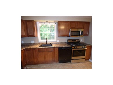 Kitchen with new tile flooring.