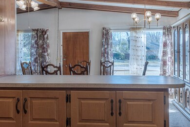 View from kitchen toward dining room & front door.