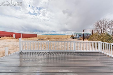Deck featuring an outbuilding