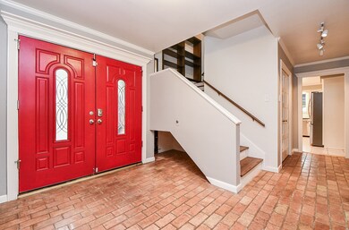 Double front doors greet you as you enter.  Sneak