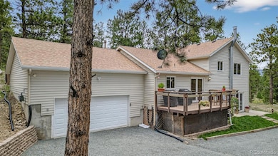 Home has oversized two car garage and low maintenance composite decking