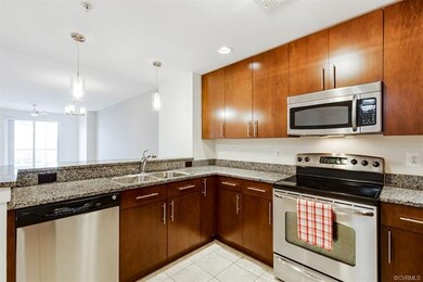 Granite counter-tops. Double bowl sink, and recess