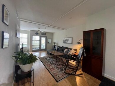 Living room featuring wood finished floors and a 