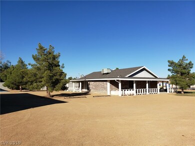 Left side and rear view of home.