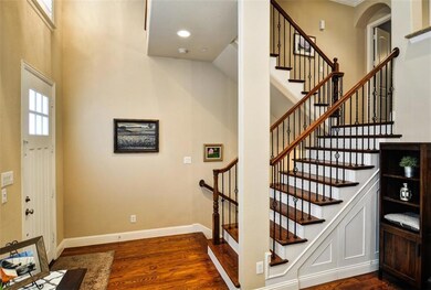 Beautiful entry with wood and iron stairs