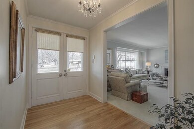 Double front door entry. Formal living room.