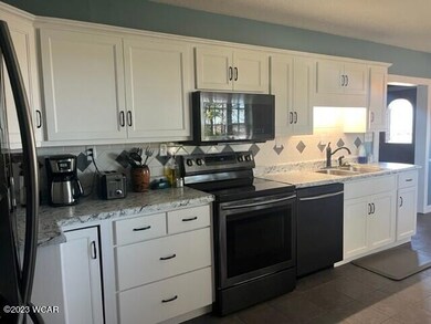 kitchen sink and stove area