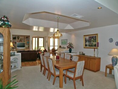 formal dining room with coffered ceiling