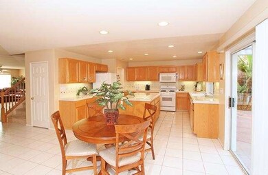Another view of the kitchen with cozy family dinin