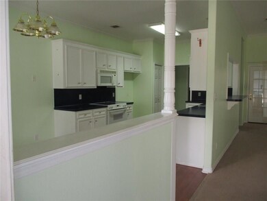 Walking into the front door is a spacious kitchen 