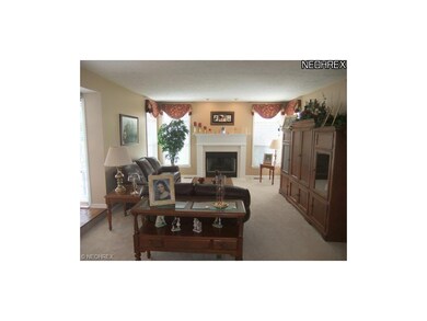 The sunken family room provides a great space to g