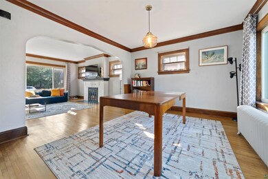 Home office featuring radiator heating unit, ornam