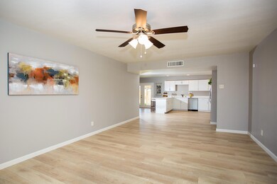 Living Rm View to Kitchen & Hallway