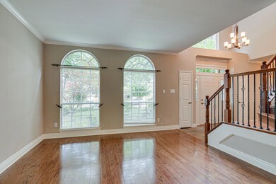 View from front living area toward the foyer. Well