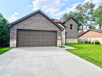 Very spacious driveway and double car garage.