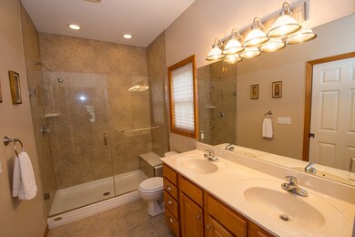 Double sink vanity and 5 ft. tiled shower!